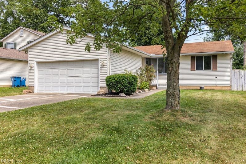 Lorain Ranch, Amherst Schools - Ready to move. Updated Kitchen and 2 full bathrooms have been completely remodeled! Separate dining space with sliding doors that lead out to the attached 20x13 bonus room with vaulted ceiling and surrounded in windows for plenty of natural lighting. Giving you the 3 season room feel with the comforts of being indoors. Large unfinished basement with Transferrable basement Waterproofing Warranty ready to be made into your next entertainment, living or rec space! Even has potential to be separate additional living space/rent income with full bathroom and bedroom already set up! 2 Car attached garage with double wide driveway, garage opener and newly paved apron. Large attached deck on back for entertaining as well as large shed for outdoor storage & side yard. Make your appointment !