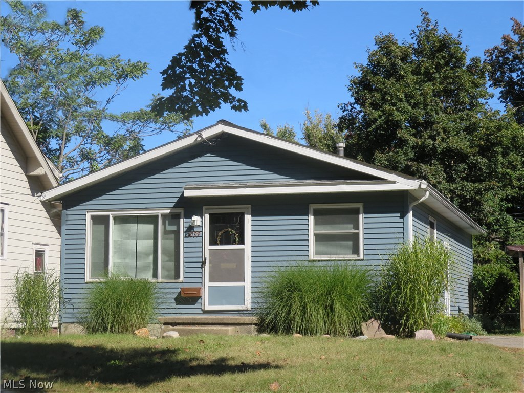 Had it with rent hikes, scrambling for spare change for laundry and someone always taking your parking space? Then jump at the chance to own this sparkling clean, affordable ranch in a premier North Hill neighborhood so nice, people seldom move! You’ll fall in love with the easy floor plan featuring a living room big enough that it will accommodate multiple couches for extra seating, and easy-to-clean laminate flooring. The kitchen has been beautifully-updated with bright white cabinets, and room enough to hold a 6 ft. dining table! The full bath has been remodeled with a new tub and shower, newer flooring and comfort height commode. Possibilities are endless in the spacious lower level, with a couple of different recreation areas. There are even furring strips in place for drywall! Talk about comfort, between the 92% high efficiency Trane furnace and vinyl windows, you’ll be all set! You'll love spring and summer here. The garden beds have been nicely tended to and it shows, with pe