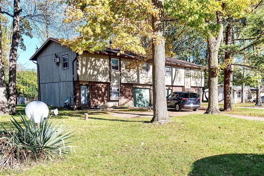 Welcome to 3121-3123 Don Dr, a solid duplex in the highly desirable Portage Lakes / Coventry area. Ideal for both owner-occupants and seasoned investors alike! Live in one side and rent the other, or add this income-producing property to your portfolio.

The home features a durable brick and wood exterior, complemented by a large, tree-lined yard perfect for outdoor enjoyment. Each unit offers a functional layout with first-floor seating areas with a cozy wood-burning fireplace, 1/2 bathroom and first-floor laundry. Upstairs you’ll enter the kitchen with a walkout back deck. A spacious living room with 2 bedrooms and 1 full bathroom, all with private garage access.

Recent updates include two new central air units installed in 2019, fresh interior paint (2023), modernized bathroom sinks and lighting fixtures, and new flooring in kitchens and living rooms in both units.

Situated in the Coventry Local School District, this property sits in a quiet neighborhood only minutes from the Portage Lakes, local parks, and restaurants—offering both tranquility and convenience.

This is a fantastic opportunity to secure a versatile multi-unit property in a strong rental and owner-occupied area. Schedule a showing with your favorite Realtor today!