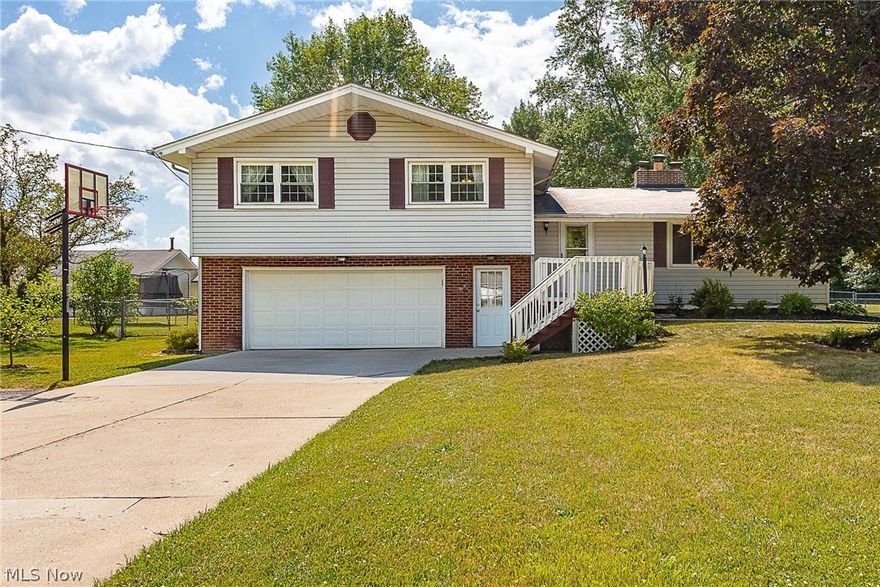 Beautifully maintained property with great interior & exterior bonuses. This property offers 4 generous sized bedrooms with new carpeting & 3 full baths. The large living room area has a fireplace, new carpet & lots of light & connects to the dining room with sliding doors to a large, well maintained deck. The kitchen has an enormous island great for just breakfast or entertaining family & friends. The lower level has an additional bonus room for playroom or craft room with sliding doors to a paver patio. A full bath & large family room with bar & wood burning stove, laundry & storage are also in the lower level. Outside, the property has a generous sized backyard with a outbuilding for storage & an additional shed for lawn mower etc. Besides a beautiful deck, there is a must see well built tree house in a fully fenced yard.