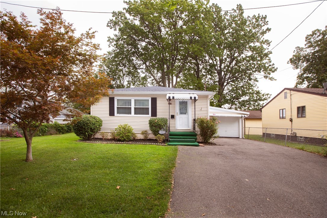 Move right into this charming ranch just steps away from Lake Erie in Vermilion on the Lake subdivision. It features 3 bedrooms, 1 full bathroom, spacious living room, dining room and eat-in kitchen that includes the range & refrigerator. Hardwood floors under carpeted rooms. There is also a full basement partially finished with a 24x23 rec room, 18x13 bonus room, laundry & storage areas, (freezer and pool table in basement stay). 1 car attached garage plus 22x16 outbuilding/garage and 18x10 storage shed. Nice yard, partially fenced. This home is adjacent to a city park with access to Lake Erie, playground & tennis courts. Minutes to Rt. 2/Turnpike, shopping, restaurants and downtown Vermilion.