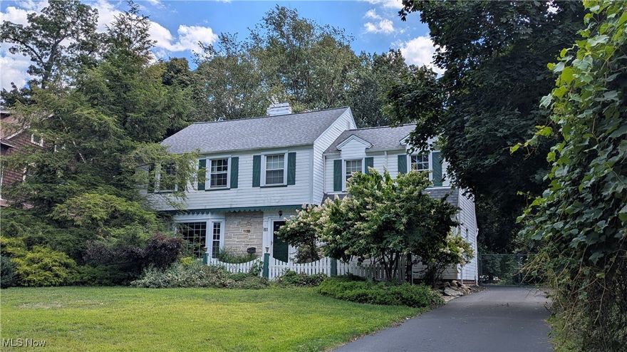 Enjoy coming home to this stately property that has a deep setback and plenty of character with over 2,600 square feet in addition to the full basement. The large living room is a place to gather around one of the fireplaces, and the nearby formal dining room is great for those special dinners. The eat-in kitchen has ceramic flooring, and the family room also has a kitchenette and easy access to one of the three full baths that could also be turned into a private suite. The den will make a great home office and has direct access to the large deck that is partially covered with a new sliding door and built-in blinds installed in 2023. The recreation room in the basement has the second fireplace and will be great for entertaining complete with wet bar. All four bedrooms are more than adequate in size and have refreshed hardwood flooring or updated carpet. Outside, the two car garage also has an attached workshop. The large rear yard is fenced.
Main house roof replaced in 2023 and the entire driveway  was resurfaced in 2024.