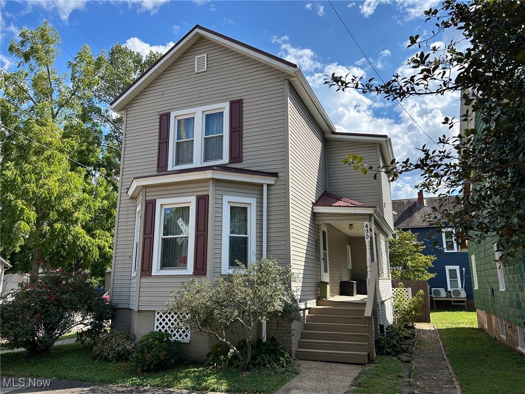 First time on the market! This beautifully maintained home has been thoughtfully updated with modern improvements, including a new roof (2025), new deck (2025), hot water tank (2025), central air (2025), carpents cleaned (2025), new toilets (2025) and so much more. The spacious living room flows into a bright dining room featuring a charming window bench seat. The kitchen features a refrigerator, range, microwave, and dishwasher that all remain, with access to the first-floor bath or direct access to the brand-new back deck, overlooking a fenced-in yard with privacy fencing, patio, and a convenient storage shed. The first floor also includes a full bath. Upstairs, you’ll find two generously sized bedrooms, a laundry room, and another full bath highlighted by a classic claw-foot tub. The full basement provides abundant storage and walk-out access to the backyard. Sitting on a desirable corner lot, this home combines historic charm with modern comfort—ready for its next owner to enjoy!