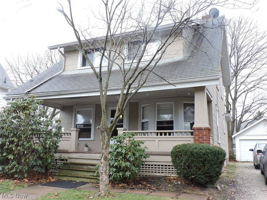 Beautiful solid hardwood floors, wood trim and baseboards throughout.  Turret window in the spacious dining room.  Has large kitchen with lots of cabinets and room for table and chairs and a pantry closet.  Bedrooms are nice size.  Large living room with coat closet.  There is a laundry shoot in the pantry closet as well as the 2nd floor bathroom with a clothes catch in the basement.  Has newer furnace, central air and glass block windows in basement.  Vinyl thermal pane windows.  Lovely covered front porch.