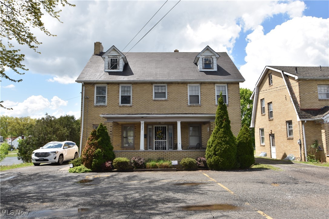 Commercial zoning. Currently used as a hair salon (owner operators interested in possibly staying). Multi-use brick building with great visibility and access to high traffic intersection! Can be "investment package" with adjoining brick house making a large double lot for future development.