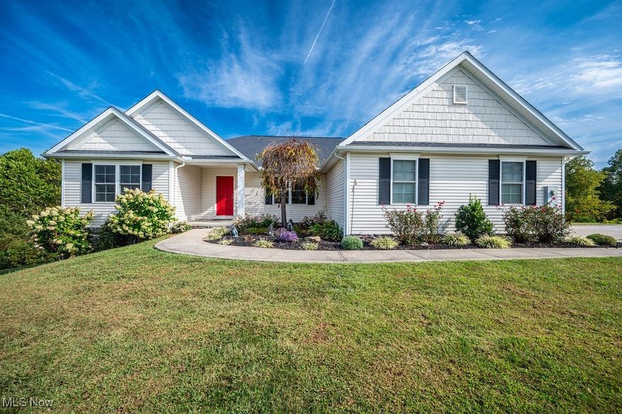 Welcome to 321 Amos Acres in the heart of Elizabeth!  This beautiful Schumacher built home is situated on 2 acres at the very end of this desirable neighborhood.  The timeless craftsman inspired exterior features stone and vinyl shakes, and is flanked by well-appointed landscaping.  The entry welcomes you to the open floor plan, with the dining area to the right anchored by large columns.  The engineered wood floors flow through the living areas to the adjacent living room with gas fireplace, and kitchen complete with oversized island and stainless steel appliance package.  A bedroom with en suite is located near the entry as well.  Just beyond the kitchen, a large walk-in pantry ensures plenty of room for kitchen and grocery needs.  The laundry area is conveniently located on the main level, just off of garage entry making this home an opportunity to enjoy true one-level living. Down the hall are another full bath and bedroom, as well as the roomy primary suite with massive bathroom.  A screened porch off of the kitchen/great room offers wooded views, with a glimpse of the neighboring pond.  The unfinished basement has poured concrete walls, ample headroom, and walk-out access- endless potential for storage, home gym, hobbies, or finishing out more living space.  An outbuilding also adds extra storage for yard tools.  With pex plumbing, 200 amp electric, AND a whole house Generac generator, this newer home offers buyer confidence in minimal maintenance for years to come.  Don't miss the opportunity to own this gorgeous Wirt county home!