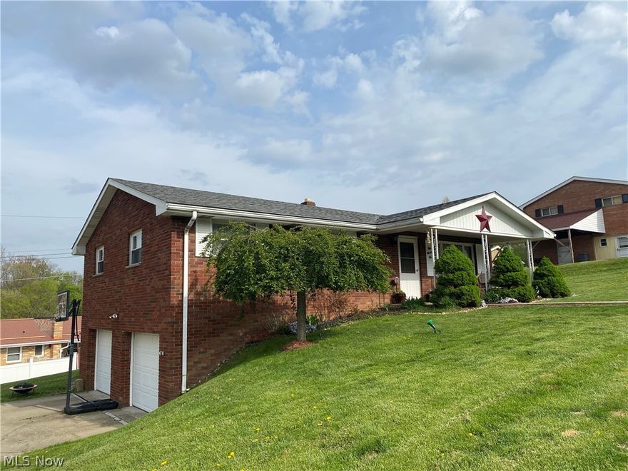 This 3 bedroom, 2 bath -solid brick ranch , located in center of Wintersville will not last long ! Beautiful inside and out with hardwood floors throughout, new laminate in kitchen, master bedroom with bath, vinyl replacement windows. Covered front porch and deck off the kitchen. 2 Car Garage !