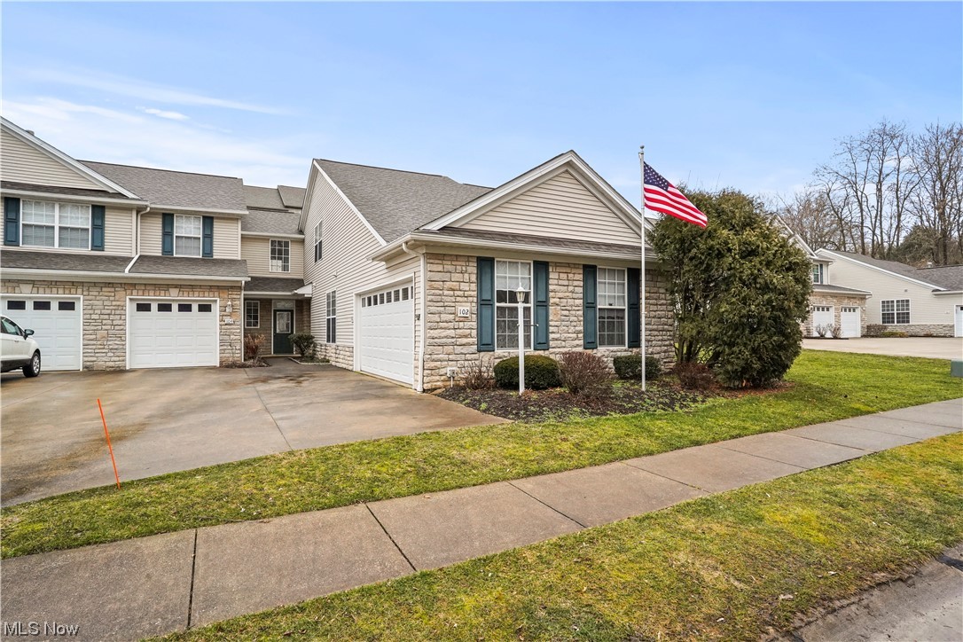 Welcome to your amazing condo on the Cuyahoga River and Hike and Bike Trail in Munroe Falls! Upon entering, you are greeted by an open-concept main floor that seamlessly integrates the living, dining, and kitchen areas. The vaulted living room features a gas fireplace and a large sliding glass door which allows tons of natural light, creating a warm and welcoming atmosphere. The kitchen boasts granite countertops, and plenty of cabinetry. The master bedroom contains a large walk-in closet and an en suite, offering comfort and privacy. The second bedroom would make a great guest bedroom or home office. On the second floor, discover a versatile loft space and full bath room. This loft area provides a unique vantage point and can be customized to suit various needs, whether as a home office, second living room, or an additional guest suite. Attached to the kitchen and living room is private patio perfect for enjoying the fresh air and serene surroundings of Munroe Falls. Don't miss the opportunity to make this condo your own!