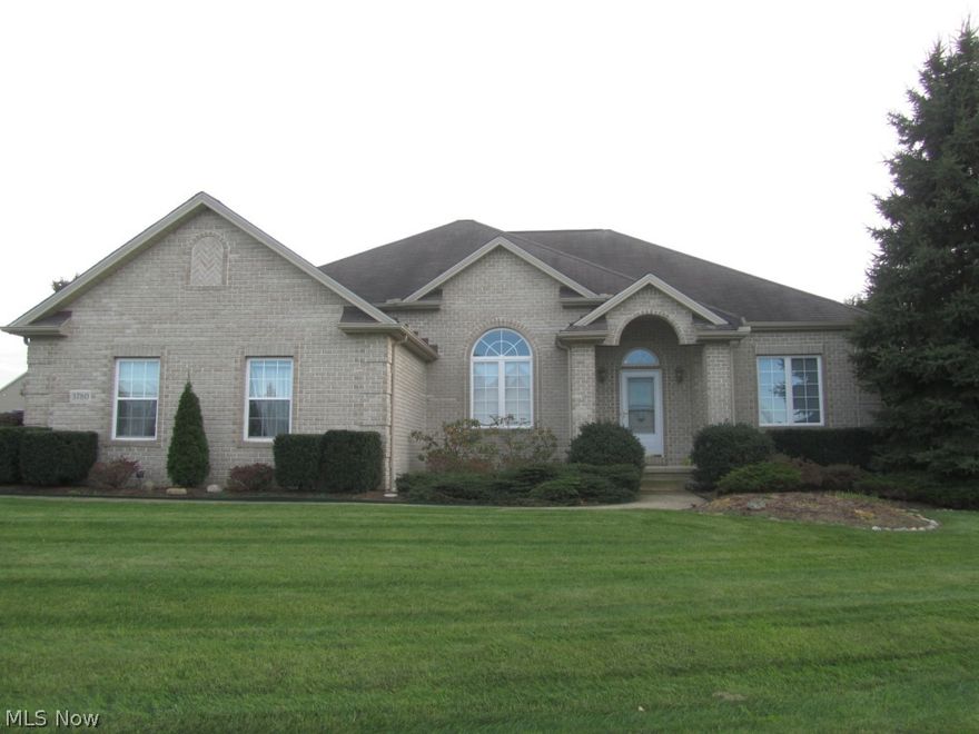 This absolutely BEAUTIFUL, move in ready, ranch home has been completely remodeled with custom upgrades through out!  This home boasts spacious an open floor plan with Brazilian cherry floors, 10-ft ceilings, some cathedral ceilings and an inviting great room accented with a gas-log see-thru fireplace.  The gourmet kitchen boasts cherry cabinets, granite counter tops, stainless appliances and a fireplace.  The deluxe master suite has a glamour bath with double vanity, jacuzzi tub and a large walk in closet.  The first floor den has double tray ceilings.  The Palladium windows, custom 1st floor laundry and full basement plumbed for a bath add to this spectacular home!  The deck is perfect for entertaining and the large yard is beautifully landscaped.  Come view today!