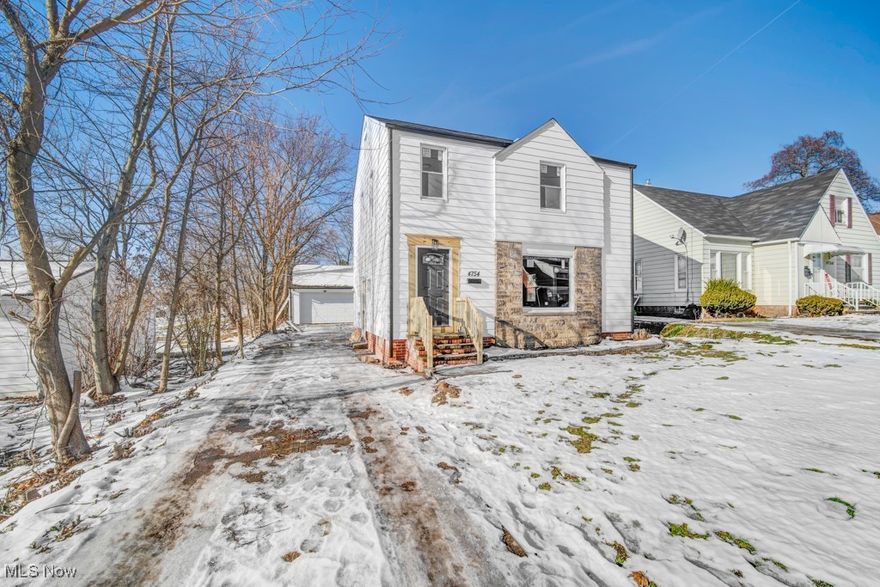 This beautifully restored 3 bedroom, 1.5 bath Colonial will surely impress you! This home has been thoughtfully updated with modern convenience. The spacious living room boasts natural lighting and a modern electric fireplace. The eat in kitchen is open and has been completely updated with great cabinet space. There is a half bath when you enter from the side door. The upper level features a well-appointed bathroom with modern fixtures and three generously sized bedrooms. The basement offers great space. The 2 car garage has a new garage door! The backyard is beautiful! The home updates include flooring, paint, kitchen, fireplace, furnace, a/c, bathrooms, windows and more. Schedule your appointment so you do not miss this great home! One Year Home Warranty Included!