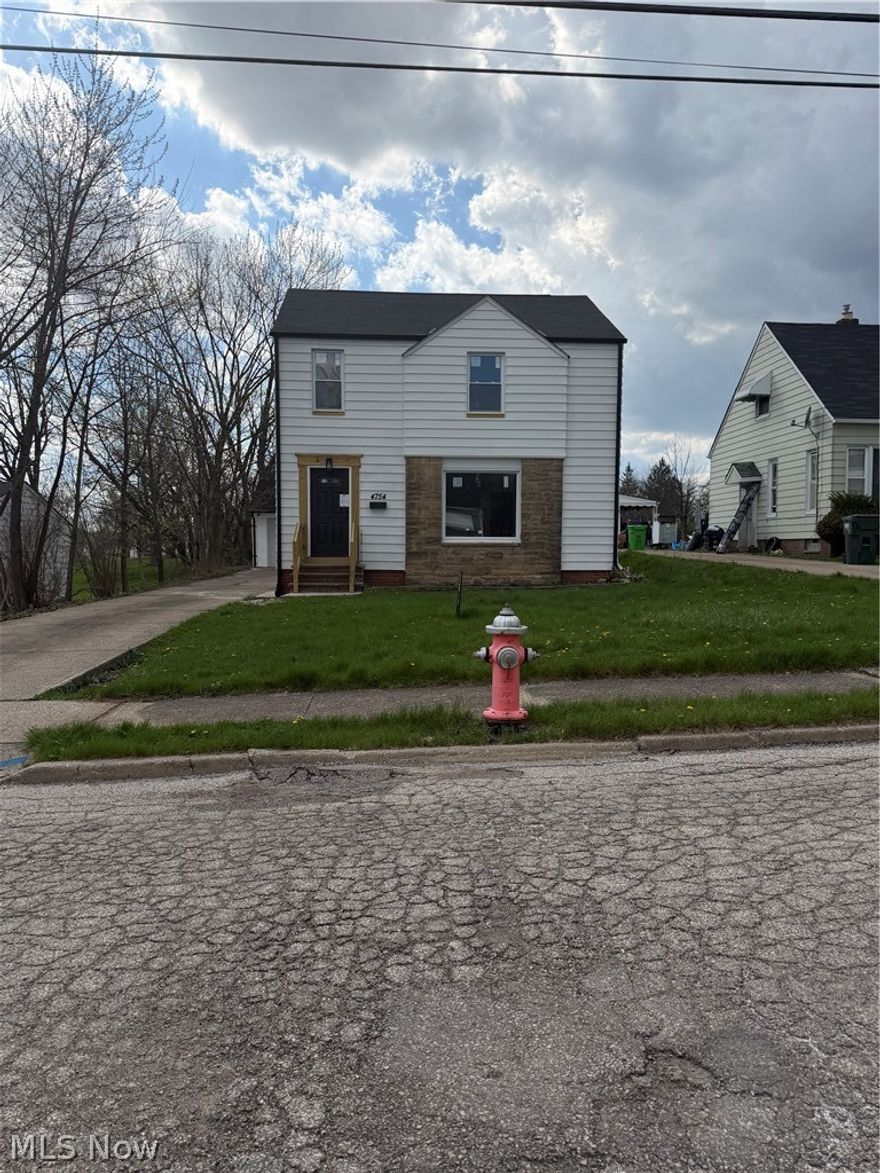 POS VIOLATION FREE! This beautifully restored 3 bedroom, 1.5 bath Colonial will surely impress you! This home has been thoughtfully updated with modern convenience. The spacious living room boasts natural lighting and a modern electric fireplace. The eat in kitchen is open and has been completely updated with great cabinet space. There is a half bath when you enter from the side door. The upper level features a well-appointed bathroom with modern fixtures and three generously sized bedrooms. The basement offers great space. The 2 car garage has a new garage door! The backyard is beautiful! The home updates include flooring, paint, kitchen, fireplace, furnace, a/c, bathrooms, windows and more. Schedule your appointment so you do not miss this great home! One Year Home Warranty Included!