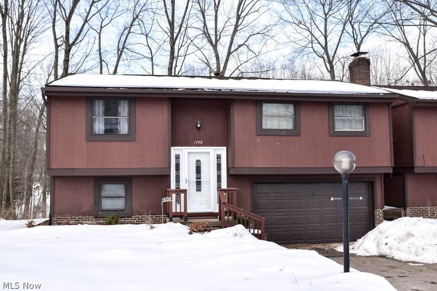 Check out this updated condo in a private wooded setting! This freestanding unit has a renovated kitchen with marble counters, tile backsplash and stainless steel appliances. 2 living areas with a main floor living room plus a lower level family room provides space for everyone! The sun filled dining room has a sliding patio door that opens to a deck with a lovely wooded view. All 3 bedrooms on the main level have ample closet space and share an updated full bath with tiled shower surround. The lower level adds a half bath, laundry area (with washer & dryer that will convey) that walks out to the attached 2 car garage. Nicely landscaped with a serene setting yet easy access to Belden Village, Massillon and Rte. 21 with a new furnace, A/C and hot water tank in 2021. Schedule your showing today!