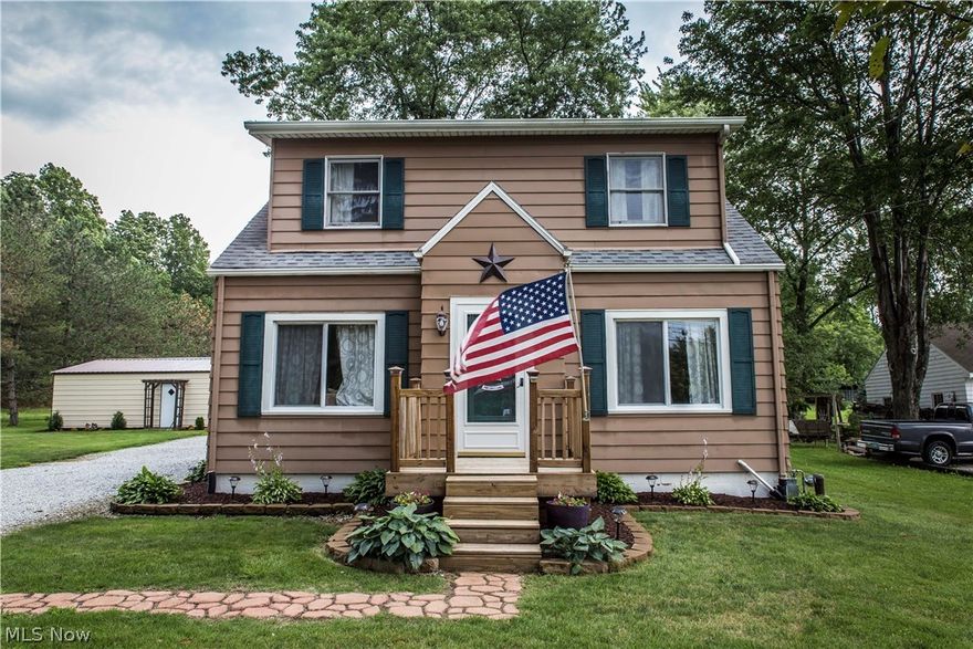 Adorable Cape on large lot! 1.96 acres with new 2 car detached garage!  Lovely living room with neutral colors, amazing updated kitchen with tons of counter space.  Two bedrooms & full bath on second floor, and a first floor bedroom on the first floor.  Lots of natural light!  Lots of closet space!  Beautiful laminate flooring throughout.  Lots of updates including, septic 2015, furnace & A/C 2009, newer vinyl 1st floor windows, electric panel 2016, garage 2016.  Potential for more sq ft in basement if finished.  Huge lot and located close to everything!