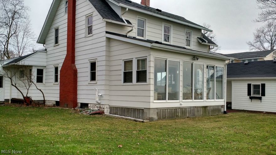 Breathtakingly beautiful LAKE ERIE Lake Front home with fabulous lake view 365 days a year. Break wall with no erosion, access to lake, boating and fishing right in your own PRIVATE back yard. A year round paradise. Home originally was owned by Willis Leiter, a famous photographer know for his postcards depicting the spirit of the times from 1905-1915 and has been modernized with time, 4 generous bedrooms, eloquent formal dining room with hardwood floors, leaded glass windows accent the formal living room and a massive wood and gas fireplace. Stunning 4 seasons room off living room with panoramic lake view. Watch the sun set and feel the cook lake breeze caress you gently in the spring, summer and fall. Let this be your personal statement of refined lakefront living. Priced to sell, owners are an estate and want the property sold now; this house is priced tens of thousands below actual realistic value.