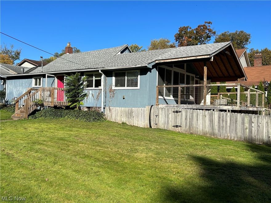 Beautiful View of Portage Lakes!!! This ranch has so much potential with multiple rooms that could be turned into bedrooms or extra living space what ever you desire! There are 2 full baths and 1 is attached to the master bedroom. The attached garage comes into a large room that could be converted to more bedrooms. There are handicap ramps that will stay. You have a nice big yard with part of it fenced in to the backed deck. the back deck looks out to Portage Lakes. There is a side covered deck that has view of the lake also. Finish this house to be whatever dream home you want!