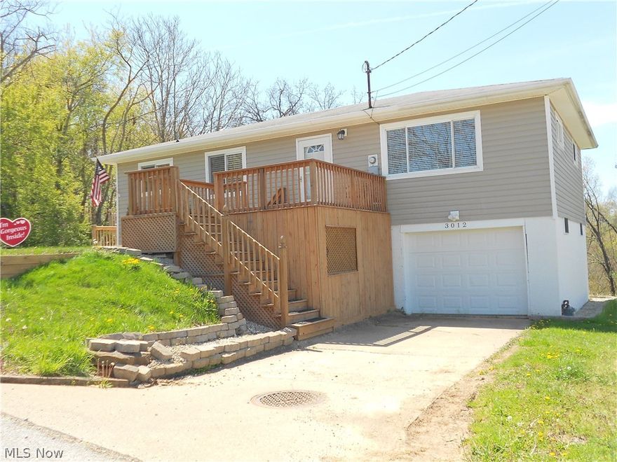 Picture Perfect and Move In Ready! Cuter than I can express. Beautiful hardwood floors, 3 bedrooms, 1 bath with decks, decks and more decks. The view is surely to WOW you!! Location is close to schools, shopping and RT 50 & I77 interstate for travel. Quiet neighborhood with only 1 immediate neighbor and no homes across the street. Wooded area to the side and back of home. Great view of Parkersburg to watch the fireworks. Decks recently built and hardwood floors redone.