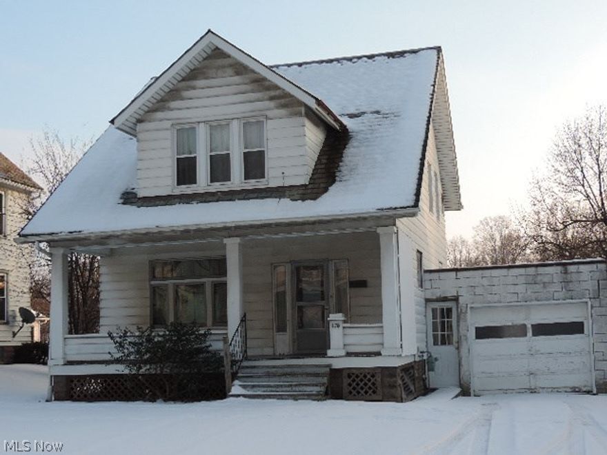 Remodeled two-story with 3 bedrooms.  Ceramic tile in the eat-in kitchen and remodeled bathroom.  Large rooms throughout.  You'll be pleasantly surprised at the condition of this home for the affordable price of $68,900.  Attached garage and ready to move in.  Possession at closing.  Let us help you get this financed.