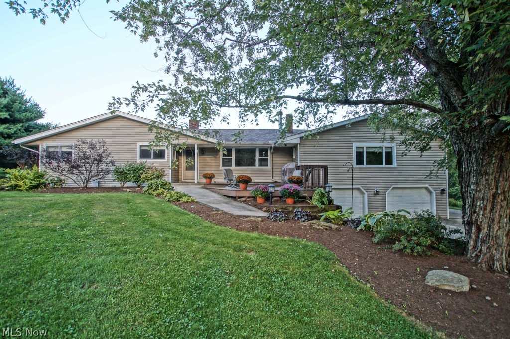 Secondary offers welcome.
Beautifully Remodeled and Updated throughout! Master suite with own living room area complete with hearth Fireplace, could be used as an in-law/teen suite. Finished basement with Bar and playroom/office. Open Cherry kitchen with Corian counters/breakfast bar and eat in dining area, access to additional office/laundry room/den that leads to deck and fenced in play/pet area. Front door with porch leads into open Living room with stone wood burning fireplace. Beautiful hardwood flooring in bedrooms and living room. 1st floor laundry hookup in two areas. The ultimate mans dream shop in the 30x40 Insulated Pole barn with water, electric, 100/220 single phase amp, Radient floor heat, built in cabinets. Newer replacement windows, footer drains, siding and electrical panel. So much to offer in this one of kind home, its all ready to move in and enjoy country living at its finest in the heart of Geauga County.