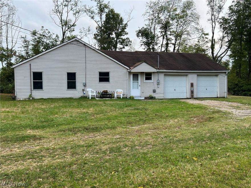 This cozy home nestled in Ravenna Township has fresh paint inside. Boasts a quiet yard, but convenient to 
Ravenna and Kent. It is hidden away and off of State Route 59 between Dollar General and
Penney’s Auto Body. A 3 bedroom, 1.5 bath home with a nice mudroom and a 2 car garage. 
Great as a home or an investment property. Seller selling AS IS.