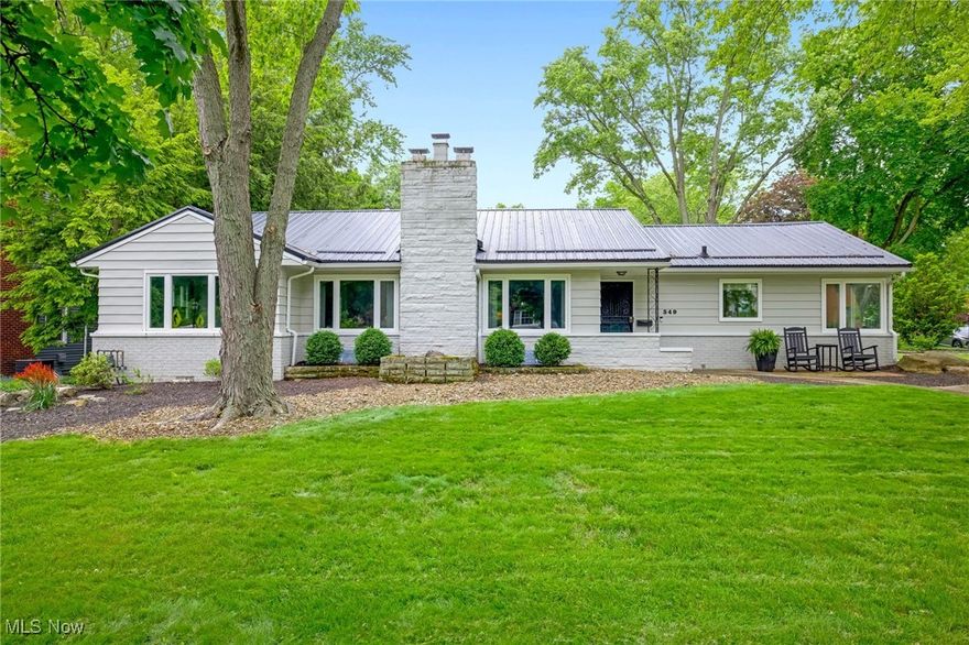 This GORGEOUS  Ranch home features 3 bedrooms, 2 full bathrooms , attached 2 car garage and finished basement! The spacious main level includes a fully updated kitchen with floor to ceiling cabinets, stone countertops, built in and stainless steel appliances! The sizable living room is complimented with two large picture windows and a beautiful gas fireplace. The large primary bedroom includes walk in closet and fully updated ensuite! Two additional bedrooms share a guest bathroom which has also been tastefully updated . Lower level boast two finished living spaces to spread out in. A drop zone is located just off the attached garage and rounds out this homes incredible interior. Exterior includes charming courtyard, private back yard and designed landscaping. Sellers have lovingly created a space that is sure to be enjoyed by anyone who visits. Notable improvements include a Metal Roof( 2020), New Windows (2024), Driveway (2024), Garage Door and lift( 2021), Glass Block Windows (2021), Functional Gas Fireplace (2022), New Fridge (2025). Updated luxury vinyl flooring and newer carpet throughout out the home.