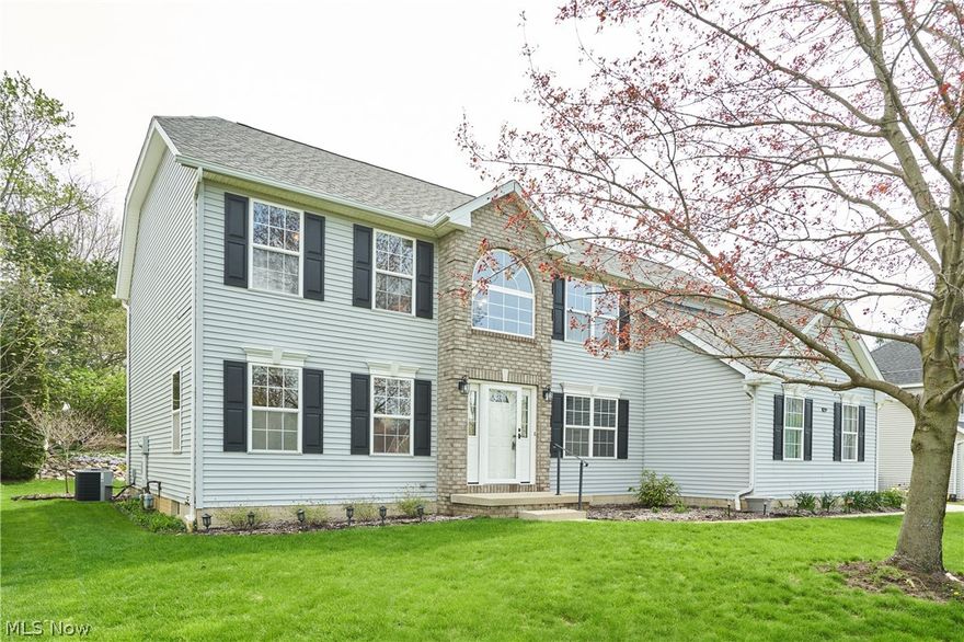 Welcome to this impressive Colonial, 2 story home, in the peaceful Wedgewood community. Located in the highly desirable Copley-Fairlawn school district.  This beautiful 4 bedroom, 2.5 bath home offers the perfect blend of comfort, style and convenance. Completely remodeled kitchen, with magnificent Cherry cabinets, soft close drawers, granite countertops/island and matching matte grey GE appliances and LED under cabinet lighting. This home has a great flow, from the kitchen to the elegant dining room, into the airy/spacious great room. Perfect for hosting family holidays and get togethers. The primary suit has vaulted ceilings and a remodeled full bath, with quartz countertops, duel sinks, brushed nickel hardware and Permastone tile flooring. The walk in shower is luxury at it's finest. There are 3 additional upstairs large bedrooms and a full bath. The Flex Room, on the main floor, can also be used as a main floor bedroom/in-law suite.
The basement offers a B-Dry waterproofing system (with transferable warranty) and 2 sump pumps keeping the basement dry. This home also offers a Bradford white HWT, Heil A/c & furnace, 2022 and new roof in 2012. You will be pleased with the large 2 car, attached garage, with ample space for workbenches, lawn equipment, bikes and storage. The private back yard offers a decorative stone patio, 14x18 ft, and will be great for summer cookouts and family fun.
There are many more upgrades you will appreciate, so, contact your favorite Realtor and schedule your private showing today!