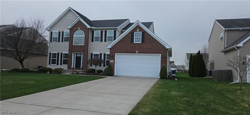 Welcome Home to Waterbury! Nestled in the sought-after Waterbury Development, this stunning 4-bedroom, 2.5-bath colonial offers the perfect blend of modern comfort and timeless charm. Built in 2013 on a spacious estate lot, this 2,864 sq. ft. home boasts an open floor plan designed for both everyday living and entertaining. Step into the two-story foyer and be greeted by a formal sitting room and dining room, leading to the heart of the home—a large kitchen with an oversized dining area, morning room, and a cozy great room with a gas fireplace. The professionally landscaped yard features a 16x20 wood deck with a gate, perfect for outdoor gatherings. Upstairs, the luxurious master suite includes two walk-in closets and an en-suite bathroom.
Additional highlights include first-floor laundry, a private office, a full basement with a half-bath rough-in, and a two-car garage. The home is hardwired for surround sound in the great room and features thoughtful upgrades like a whole-house surge protector, humidifier. Within walking distance of the community pool, this home is part of a vibrant neighborhood with a clubhouse, playgrounds, and miles of walking trails. Don’t miss your chance to own this move-in-ready gem in North Ridgeville!