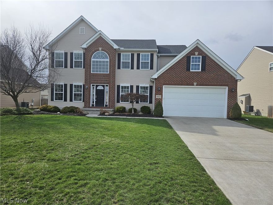 Welcome Home to Waterbury! Nestled in the sought-after Waterbury Development, this stunning 4-bedroom, 2.5-bath colonial offers the perfect blend of modern comfort and timeless charm. Built in 2013 on a spacious estate lot, this 2,864 sq. ft. home boasts an open floor plan designed for both everyday living and entertaining. Step into the two-story foyer and be greeted by a formal sitting room and dining room, leading to the heart of the home—a large kitchen with an oversized dining area, morning room, and a cozy great room with a gas fireplace. The professionally landscaped yard features a 16x20 wood deck with a gate, perfect for outdoor gatherings. Upstairs, the luxurious master suite includes two walk-in closets and an en-suite bathroom.
Additional highlights include first-floor laundry, a private office, a full basement with a half-bath rough-in, and a two-car garage. The home is hardwired for surround sound in the great room and features thoughtful upgrades like a whole-house surge protector, humidifier. Within walking distance of the community pool, this home is part of a vibrant neighborhood with a clubhouse, playgrounds, and miles of walking trails. Don’t miss your chance to own this move-in-ready gem in North Ridgeville!