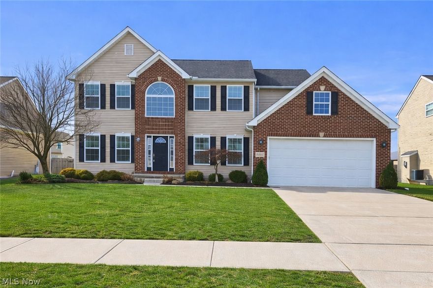 Welcome Home to Waterbury! Nestled in the sought-after Waterbury Development, this stunning 4-bedroom, 2.5-bath colonial offers the perfect blend of modern comfort and timeless charm. Built in 2013 on a spacious estate lot, this 2,864 sq. ft. home boasts an open floor plan designed for both everyday living and entertaining. Step into the two-story foyer and be greeted by a formal sitting room and dining room, leading to the heart of the home—a large kitchen with an oversized dining area, morning room, and a cozy great room with a gas fireplace. The professionally landscaped yard features a 16x20 wood deck with a gate, perfect for outdoor gatherings. Upstairs, the luxurious master suite includes two walk-in closets and an en-suite bathroom.
Additional highlights include first-floor laundry, a private office, a full basement with a half-bath rough-in, and a two-car garage. The home is hardwired for surround sound in the great room and features thoughtful upgrades like a whole-house surge protector, humidifier. Within walking distance of the community pool, this home is part of a vibrant neighborhood with a clubhouse, playgrounds, and miles of walking trails. Don’t miss your chance to own this move-in-ready gem in North Ridgeville!