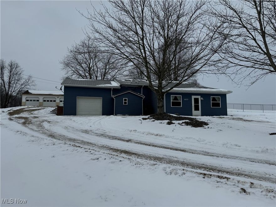 In a good location between Millersburg and Nashville. This well-built home was constructed in 1988 and updated in 2020 offering approx. 2500+ square ft. of living area, on 1.05 acres. The main floor has an open kitchen fully furnished with appliances along with a dining area leading into a separate dining room. The main floor also includes a living room, bedroom, half bath, and breezeway/laundry area leading to a large, attached garage. The second level includes the master bedroom with a full bath as well as 2 additional bedrooms and a 2nd full bath. Outside of the home is a 24x40 pole-built shop/garage w/concrete floors. Utilities include geothermal heat, private septic system, and water well. This prime offering is on 1.05 acres with room for a spacious backyard or room to keep a horse or two.