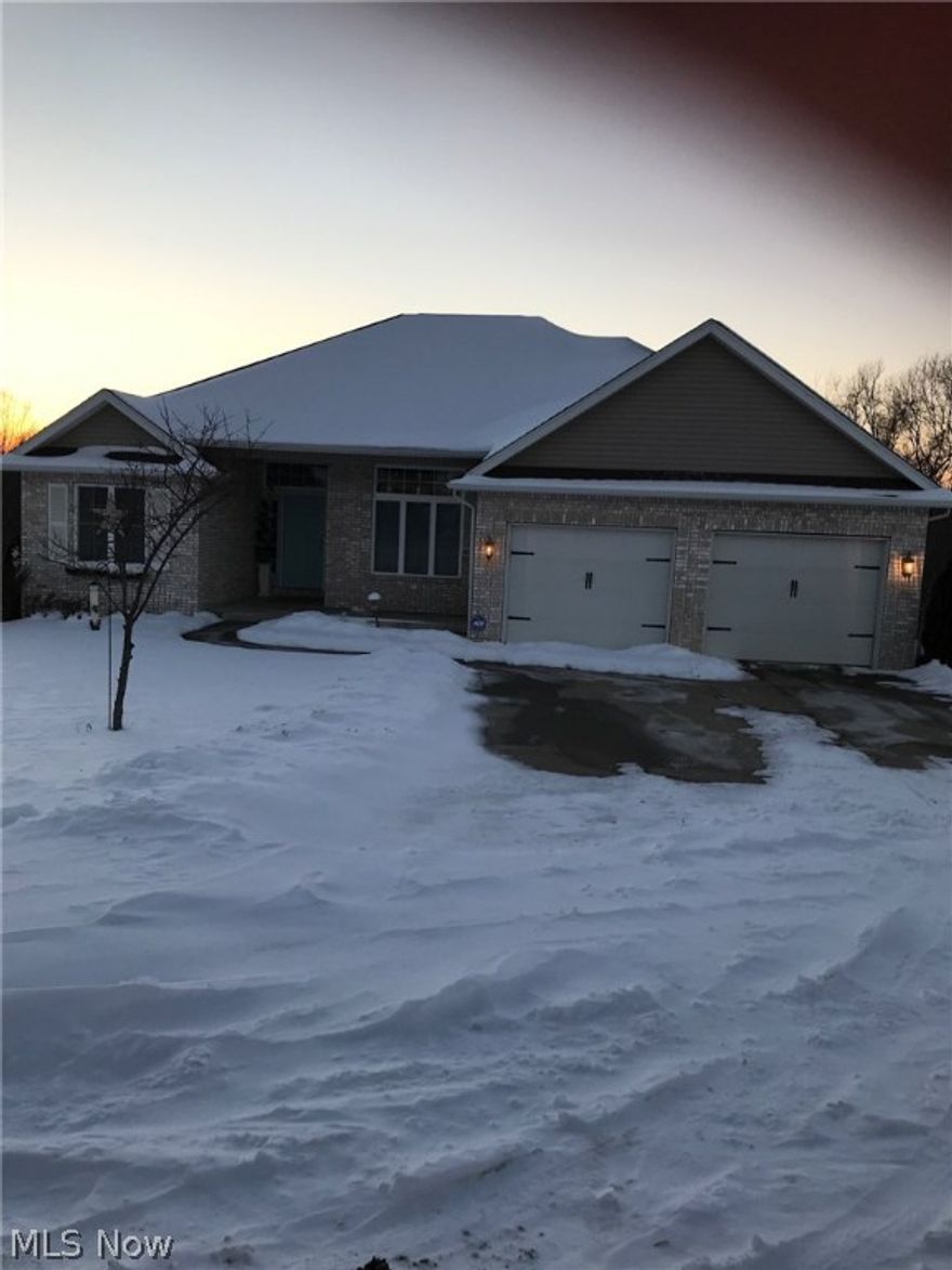 3365 sqft  Open this door to a beautiful high ceiling entrance foyer that highlights the open formal dining room. This room boasts a large transom window with natural light. Included is the open airy beautiful great room with a bank of the same gorgeous windows. Custom plantation shutters are great for privacy and adjusting the light. Moving forward into the large spacious family kitchen is an adjoining eat in area with several windows that make this area light and airy. A bar separates the kitchen from the comfy sitting area which heats with warmth from the gas fireplace. This is right in the kitchen! Also on this side of this beautiful home is a bath, laundry and the entrance to the large double car garage. Waking from the foyer to the other side of the home their are two nice sized bedrooms separated by a full bath. Walking Back to the foyer we are going straight forward into a very private large master retreat. This area has a very large walk in closet , a jacuzzi tub, sink, and a