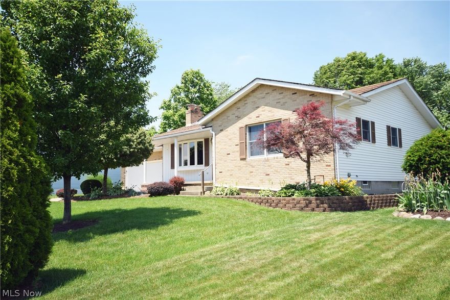 Backyard fun in the sun is yours in this 2 or 3 Bedroom Ranch. Privacy fenced yard with an attractive uniquely shaped pool.  Large pool house for changing area also hides the pool equipment. Plenty of grassy area, get out the corn hole games!   Roomy rounded deck overlooks it all and from there you enter the sunroom addition which has skylights in the wood finished cathedral ceiling.   On the main floor you'll find a large kitchen with Corian countertops, appliances that stay and a dining area with room for all your friends and family to be at the table. 2 FULL BATHS! Master has large shower, Guest has tub/shower, PLUS a convenient half bath near the kitchen and garage.  Living room fireplace flanked by cabinetry to personalize your way.   The fun continues indoors in the finished basement rec room with bar area, fireplace, and possible 3rd Bedroom. Basement entrance from the center of the home, but also has a walk out to the garage from the basement laundry area.   Owner is providing a 1 Year Home Warranty for you and your new home, see it soon!