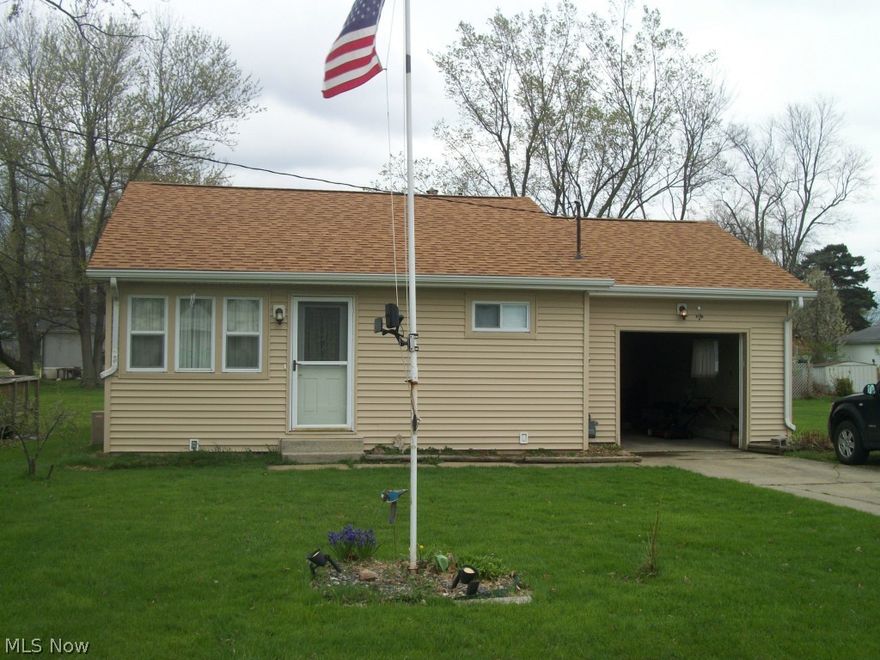 Nice Cozy 2 BR, 2 bath ranch home with nice oak kitchen, dishwasher, laundry room, dining room, back deck & 1 car attached garage.  Nice partially fenced back yard with a back deck & an extra 50'x141' lot.