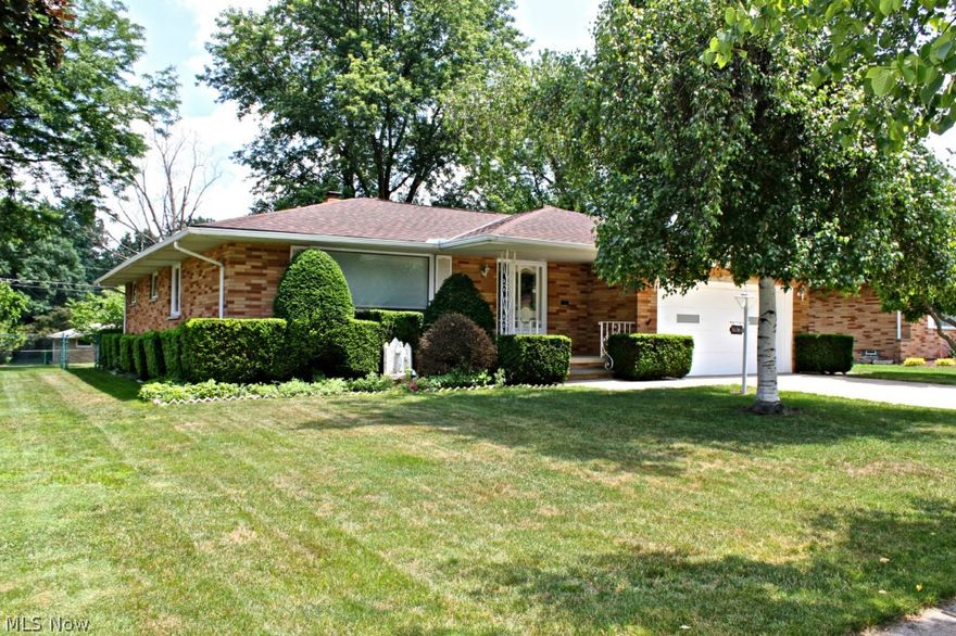 Pride of ownership shines throughout this all brick ranch in Seven Hills. This great home boasts lovely landscaping, 3 spacious bedrooms, 1 1/2 baths, huge basement & sprawling fenced-in backyard w/ patio.  Charming front porch leads to the inviting foyer with hardwood floors. The bright living room opens to the intimate dining room. Large eat-in kitchen w/ appliances included & ample cabinet & counter space!  Family room w/ built-ins and slider leading to the private patio overlooking the peaceful backyard. 3 generously sized bedrooms w/ original hardwood floors under the carpet. Huge full basement w/ recreational space & large storage area. Meticulously maintained inside & out w/ many important updates including complete roof tear off June 2014, hot water tank (2012) & new hardwood floors throughout the kitchen,foyer & hallway. Conveniently located near schools, shopping, Metroparks & quick interstate access!