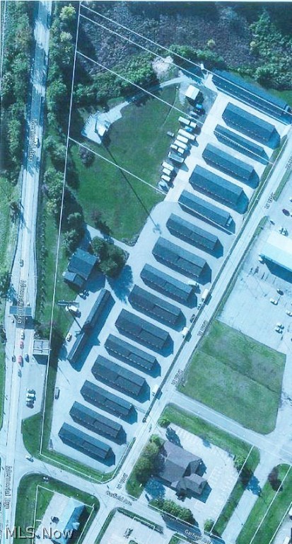Multiple buildings on 8.28 ACRE parcel M/L. Building include office/apartment building built in 1991 with GFA/CA and a 2nd floor 2 BR/2 BA apartment. The adjacent RV storage garage. Warehouse buildings range in age from 1982-2007. Unit C contains an office and an apartment. Breakdown of 435 rental units are: 63- (5x10); 121- (10x10); 49- (10x15); 165- (10x20); 19- (10x25); 12- (10x30); 1- (12x30); 5- (14x30)