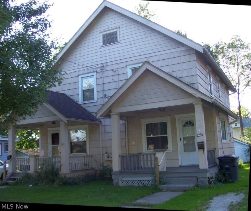 Great investment in Kenmore. Each unit has 2 bedrooms, living room, dining room & kitchen with small eating area. Full basement. Detached garage; freshly painted; nice carpet, newer windows in 2012, new a/c in 2013 and hot water heater; glass block windows in 2012; next to church; close to x-ways.