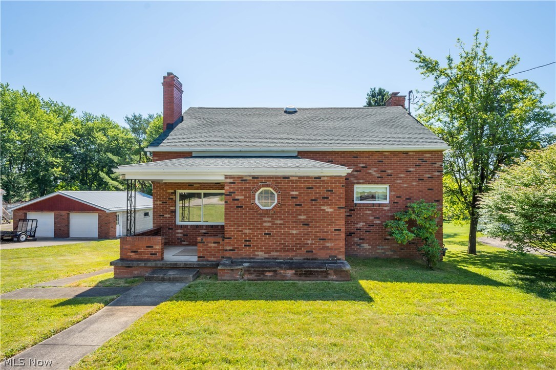 Lay out the Welcome mat at 407 Old Colliers Way! This home has been meticulously cared for over the years, and pride of ownership shows. Located minutes from the highway, this is the absolute perfect location. This home has 4 bedrooms, 2 full bathrooms, spacious living room, dining room, kitchen and enclosed patio. The lower level has a large finished rec room with a fireplace and bar, 2nd kitchen equipped with gas stove and refrigerator, 2 utility/storage rooms, as well as a large laundry area and a shower. Right outside the basement you have a nice covered patio perfect for entertaining. Looking for garage space?? This is it! This huge 4 car garage is the perfect addition to an already amazing home. If you're looking for quality craftmanship, tons of space, privacy, and location- this home has it all. Call today for your tour!