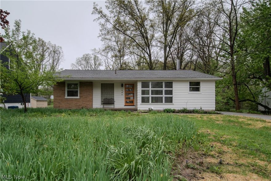 There's a remodel, then there's a remodel done right. This 1950's ranch has had a serious upgrade and feels fresh, modern, and is just waiting for you to make it your own. You'll love the covered front porch. Great space for some potted plants, or your Amazon packages, lol. Step inside the front door, and you've got a gorgeous eat-in kitchen with sage green cabinets. The light fixtures and finishes throughout the home feel stylish but never trendy. The kind of thing you'd have picked out yourself, but it's already done for you. The floor plan flows easily, so even though it's a cozy space, the open living areas and light color palette make it feel spacious. The living area has such a cool fireplace and looks out over the backyard, and it'll be a gorgeous view throughout every season. There's a concrete patio if you want to enjoy it from the outside, too. There are three bedrooms and a shared bathroom with dreamy tile work to round out the main living space. The basement is partially finished, with a second fireplace and a second full bathroom. You'll have a flexible space to suit your needs and extra storage. This one is ready and waiting, but it won't wait long! Make your offer today.