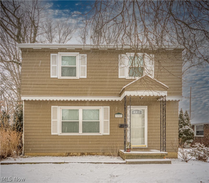 Here's a Colonial in the Falls that has a master suite/family room addition added! The traditional formal living room and formal dining room have the "hardwood look" designed ceramic floors. The kitchen is spacious with ample cabinets and stainless appliances. It opens to the 21 x 16 family room with windows across the back and side welcoming the natural light. A 1/2 bath completes the first floor. 4 bedrooms and 2 full baths up! Extra features include ceiling fans throughout, 3 bedrooms with pergo floors,new windows in 2015, custom window treatments, blown in insulation and an updated electric panel. One bedroom has a staircase to the third floor 12 x 12 office. Plus there is a 2 car garage with a new garage door and a semi private backyard. Nice convenient location, great home!