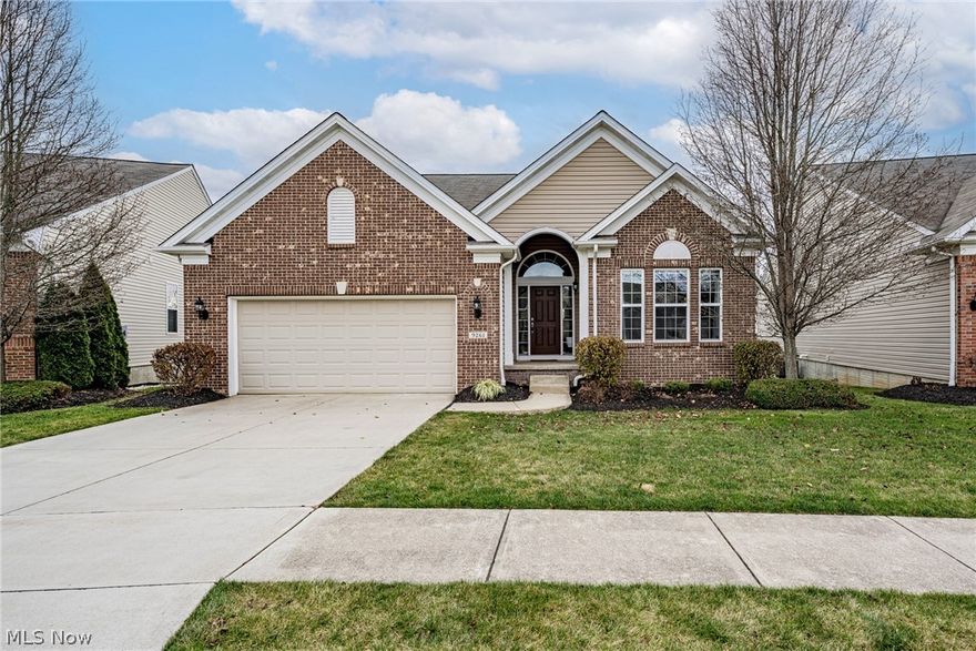 Wow! Move right into this beautiful, well-kept ranch in the desirable Schneider Reserve community. Built in 2010, this lovely home features over 3400 square feet of living space with 3 bedrooms, 3 full bathrooms, spacious open-plan living areas, an expansive, walk out lower level, and fabulous outdoor entertaining spaces, featuring creek and pond views! The front door opens into a welcoming foyer that flows into the great room & dining room, offering soaring ceilings, a gas fireplace, and a full wall of windows that fill the space with light. The great room connects to the kitchen that includes a full complement of stainless steel appliances, granite countertops, gleaming hardwood floors, glass tile backsplash, bar seating, and a bright eat-in nook with a sliding door that opens on to a large, elevated deck, the perfect place to take in a sunset. The owner's suite offers vaulted ceilings, an ensuite full bath with dual sinks, soaking tub, tile shower, and generous walk-in closet. Off o