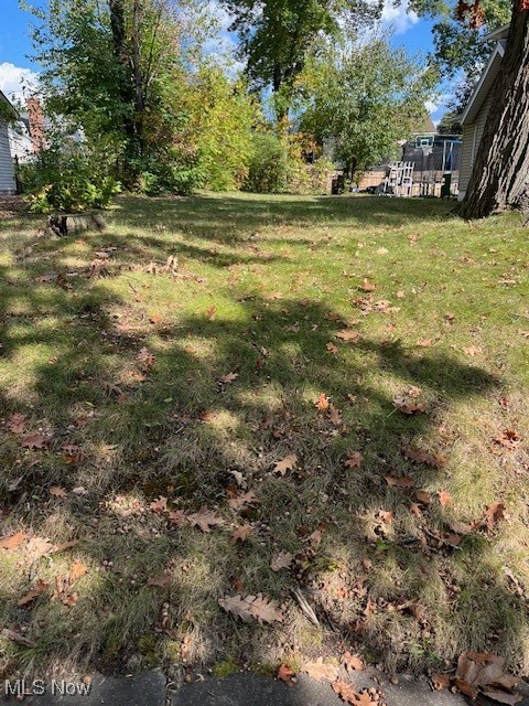 Nice, flat lot in West Akron. The previously existing home was razed.