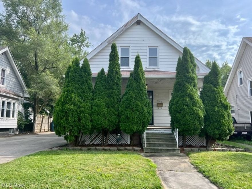 WOW!  This home has been freshly painted and is ready to move in.  Private yard with large deck plus patio.  Double wide concrete drive to large two car garage.  Front porch.  Basement has half bath with new carpet plus large laundry room.   Call for your personal tour.