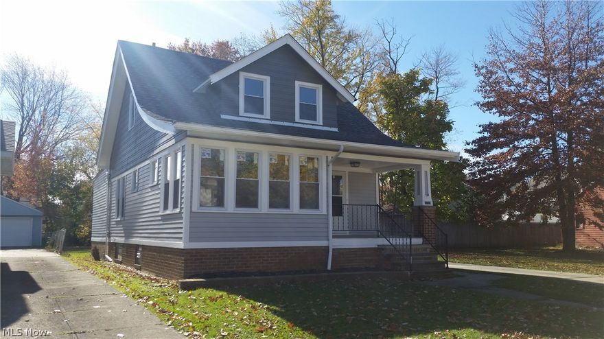 This home has everything that you are looking for!!! The first floor features all hardwood floors and a completely remodeled kitchen with granite counter tops, island table and all new stainless steel appliances that stay! First floor bedroom with full bath.  All windows are brand new. Three nicely sized bedrooms.  Newly built 2 car garage. Brand new roof and exterior paint.  There is no reason to search any further; this home is it! Wont last long!  Owner willing to install brand new a/c unit depending on offer.