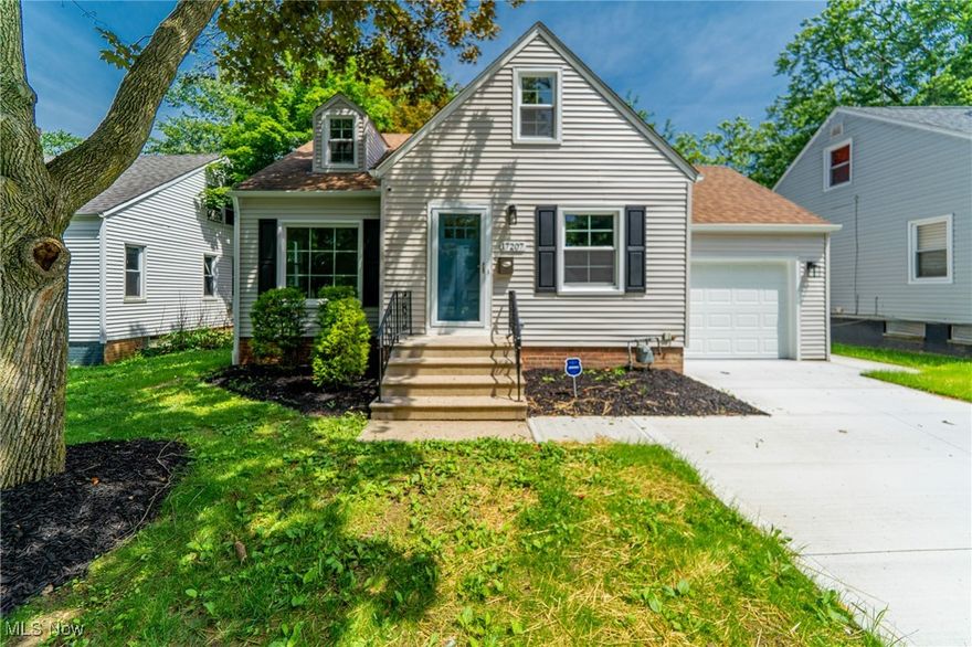 Don't miss this charming 3-bedroom Cuyahoga Land Bank renovation in Maple Heights! Much of the house was updated during this recent renovation, including new windows, a new concrete driveway and patio, new furnace and air conditioner, a whole house rewire, new plumbing supply throughout, basement waterproofing, and all new modern fixtures and finishes. Enter through the front door foyer and into the cozy, light-filled living room with picture window and view of the tree-lined street. Open to the living room is the eat-in kitchen with all new high-end finishes including new cabinets, tile backsplash, granite countertops, stainless-steel appliances, and quick access to the attached garage. Two bedrooms and a full bathroom with beautiful ceramic tile flooring and tub/shower surround can also be found on the first floor. The second floor features a bonus room with built-in shelving, a spacious bedroom, a walk-in closet, and a convenient half bathroom. The waterproofed basement offers plenty of storage space or possible additional living space, and the attached garage with direct access to the house and backyard is perfect for those cold or rainy days. Maple Heights offers a tax abatement on renovated homes, up to 100% for 15 years. Buyer can inquire with the city for more details. 1-year America's Preferred Home Warranty is included. Schedule your showing today!