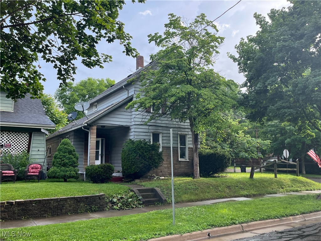 Welcome to this 3 bed/1bath colonial in the heart of Akron. This home boasts a large eat-in-kitchen with ample counter space and cabinetry. The sizable living room has hardwood flooring. There is also a bedroom and full bath on the main level. The additional room completing the first floor could be used as an office or family room. On the second level you will find two more nicely sized bedrooms. All of this plus a covered patio and a two car garage! Seller is agreeable to split the cost of a roof with potential buyer. Call to schedule a showing today!