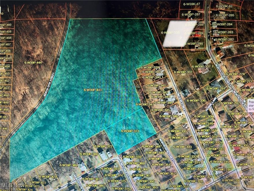 11+ Acre lot (currently all wooded) on N 12th Street for you new private homestead or just a weekend getaway in the middle of town.  MINERAL RIGHTS DO NOT CONVEY.