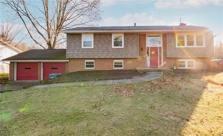 This one is a must see! Open the front door and you'll know this is the right one! Open floor-plan with large remodeled maple kitchen, open to the living room and dining area with a patio door leading to the deck. Main level also includes three bedrooms and a bathroom that grants access to the owner's bedroom. The lower level family room features a beautiful fireplace with white built-in cabinets and walks out to the patio. Also included is a full bathroom, 4th bedroom area, laundry room and a large workshop space. The lower level boasts brand new 2021 flooring, drywall, paint, and trim. Large fully fenced in backyard. Pressure tank, water softener, and refurbished kitchen cabinets 2021. Newer deck freshly painted in 2020. Range 2020. HWT 2017. New fence 2016. Windows, vinyl shake siding 2012. This home is a great value and will sell fast so schedule your showing today!