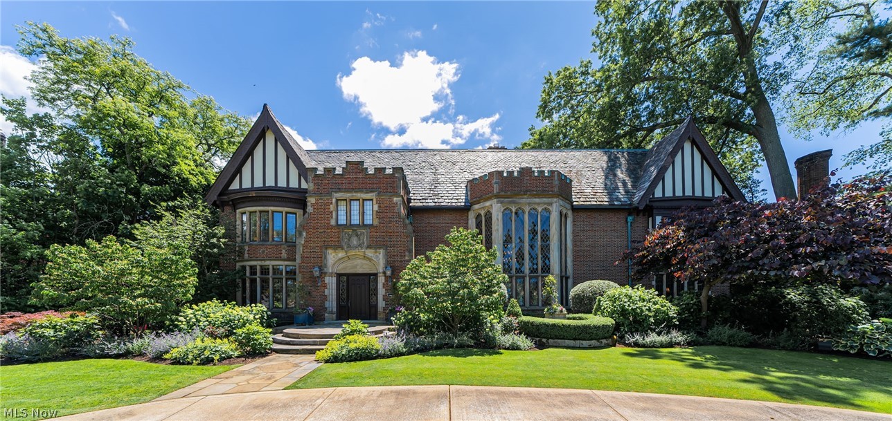 Considered by many as one of the most beautiful and gracious homes in NE Ohio, this majestic Tudor/Jacobethan masterpiece is nestled within the revered landscape of Shaker Heights. The present owners refer to themselves as "great stewards" and have meticulously and lovingly restored and renovated this masterpiece since their ownership began in 2009. The restoration list is in the supplements and is as descriptive as the work itself. The home appears in both Richard Campen's book "Distinguished Homes of Shaker Heights" (page 59) and "Tudor Revival Homes in America from 1890 to the Present" by Lee Goff.
Often referred to as "The Horvitz home”, Samuel Horvitz commissioned famed architect Reynolds H. Hinsdale to design this extraordinary residence, which remained in the Horvitz family for 60 years. The present owners have lived here for 15 years and are just the third owners of this 1929 historic, award-winning residence. The restoration is a testament to bespoke craftsmanship and timeless design throughout the house. The kitchen restoration, expertly conceived by Chuck Fazio, seamlessly integrates modern functionality with the original architectural ethos of the home. Every element, from the cabinetry to the meticulously selected stone, upholds the integrity of the home's illustrious heritage. Other improvements include a completely redesigned, spacious and modernized primary bedroom suite, a spectacular wine cellar, and many other exceptional features.
The embodiment of refined living extends beyond the confines of the interior, as the estate unveils its "happy places" within the enchanting embrace of both Japanese and English gardens. These verdant sanctuaries, meticulously curated and nurtured, evoke a sense of wonder and tranquility that transcends the ordinary, inviting inhabitants to bask in the splendor of nature's embrace.