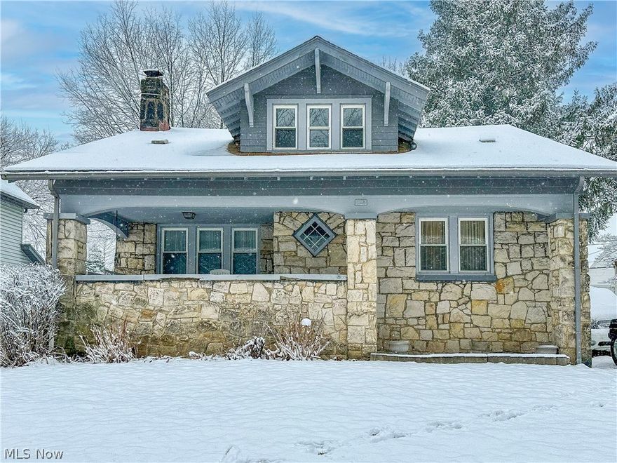 Welcome home to 528 Sunset View Drive! Don't miss this cozy stone-faced century home minutes from Highland square! Enter into a spacious living room boasting a wood burning fireplace and continue into a formal dining room with a window seat and built in cabinets. Your main level also offers a fully applianced kitchen and a half bath. Hardwood floors under all main level carpet! Three bedrooms and full bath are located on the upper level with plenty of closet space.
The walkout basement offers loads of shelves and storage space. Enjoy your summer evenings swinging on your front porch or entertaining guests in your private backyard. Don't miss your opportunity to own this home. Schedule your private viewing today!
