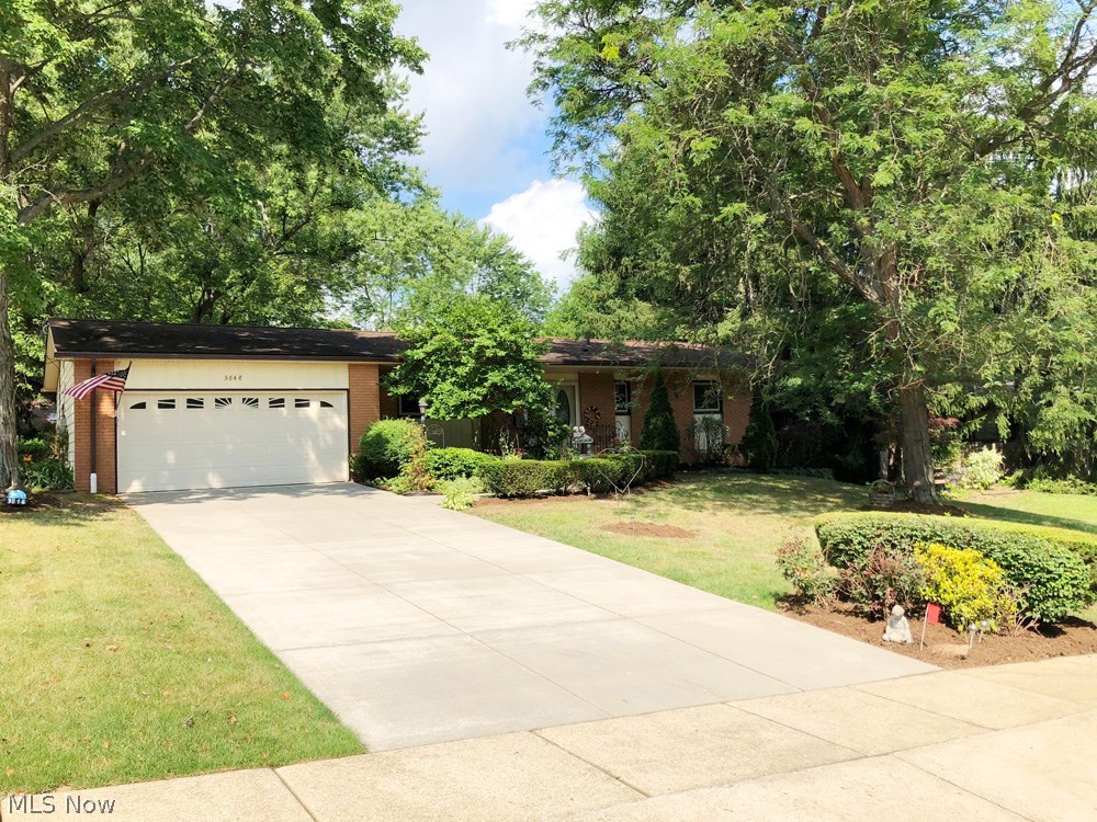 This is an attractive and well maintained brick & sided Ranch home with walk-out Basement, 2.5 baths that have been updated with new shower surround and shower doors in both master & main bath, updated Kitchen includes all appliances and features re-faced cabinets in 2010. Windows were replaced in 2009 with quality Stanek Windows, also glass block windows were added in basement. New Concrete driveway in 2007 along with the replacement of Sun room windows, Furnace room waterproofed in 2008 and updated in 2014. There is a see thru brick fireplace between living room and family room. a remote controlled gas log was added in 2016, The exterior sump pump (at walk out of basement) was replaced and drains and pipes cleaned in 2018, there is a brick paver patio at walkout basement. Seller added a convenient 1st floor laundry hook-up in the Sun Room in 2017. In 2012 The concrete patio and walk in rear was replaced. In 2013 the hot water tank was replaced and at same time carpet was replaced