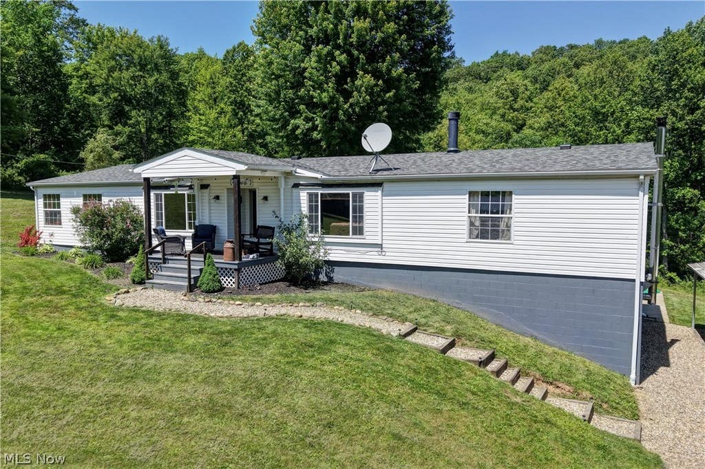 Photo of 557 Beans Road SE, Sherrodsville, OH 44675 (MLS # 5223041)